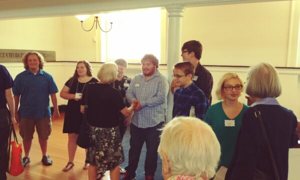 Youth Group greeting the congregationafter service