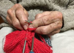 Mary Nash knitting hands